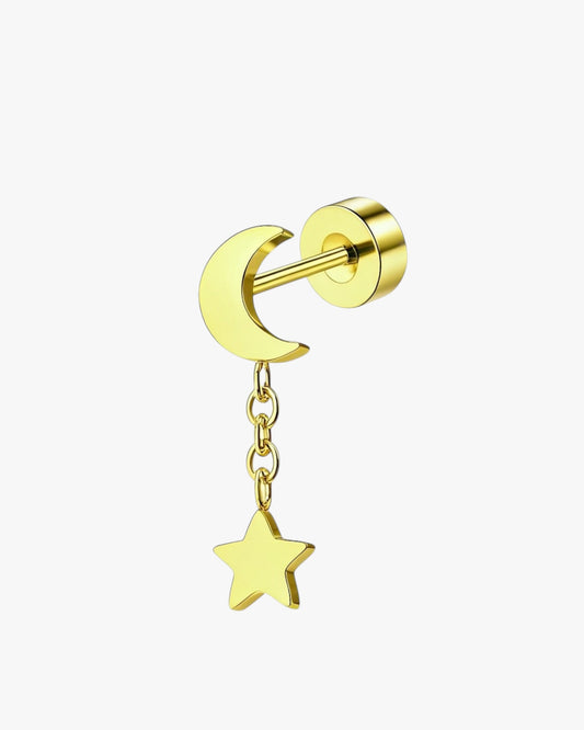 Gold earring with moon and star design on a white background