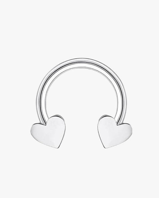 A silver-colored hoop-shaped body jewelry with two protruding ends, against a white background.