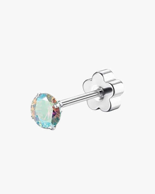 A double-headed stud earring with a rainbow-colored gemstone in the center, with a silver-tone setting.