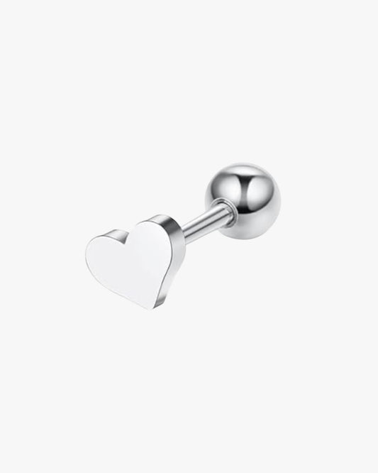 A silver-colored stainless steel stud earring in the shape of a heart.