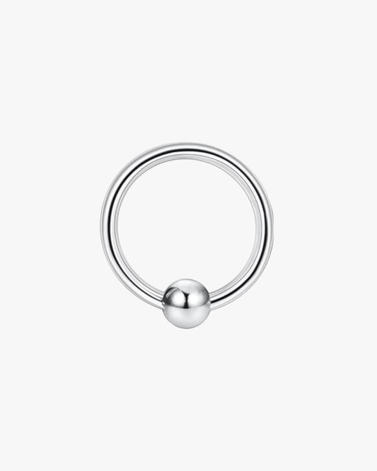 A silver-colored stainless steel clicker hoop with a smooth finish and a ball-shaped detail in the center.