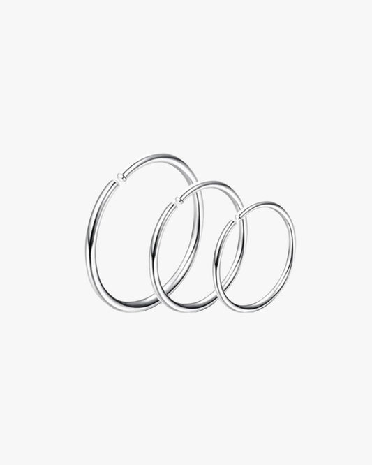 Polished stainless steel huggie hoops, sleek look