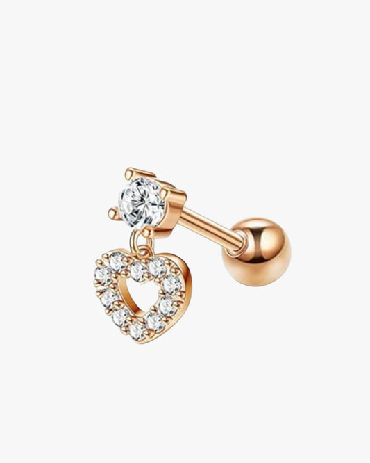 A rose gold-colored stainless steel dangle heart stud with a small diamond in the center, surrounded by smaller clear crystals.