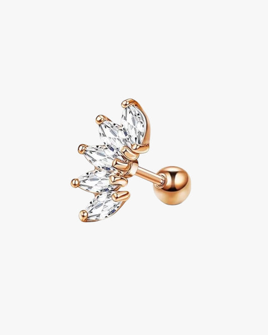 A single rose gold-colored stud earring with a clear, intricately designed pattern of diamonds.