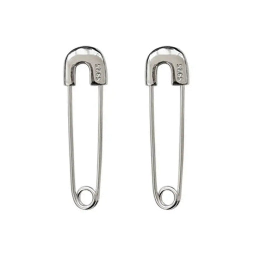 A pair of silver-colored safety pin earrings made of sterling silver.