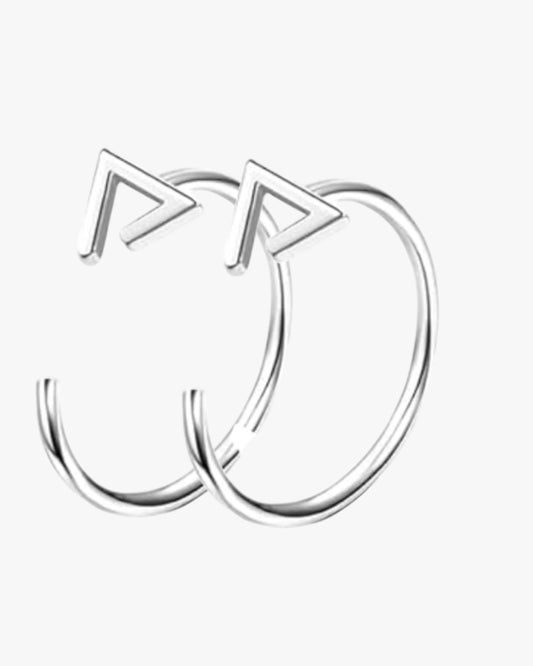 A pair of silver-colored stainless steel hoop earrings with a geometric design.