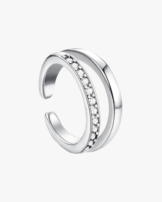 A silver-color cuff with zirconia stones set along its length.