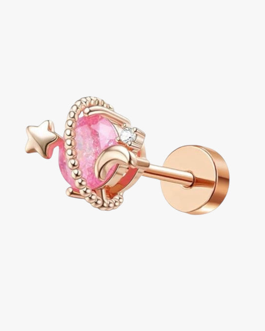A rose gold-colored stud earring with a textured surface, featuring a central pink stone surrounded by smaller clear crystals, attached to a metal post.