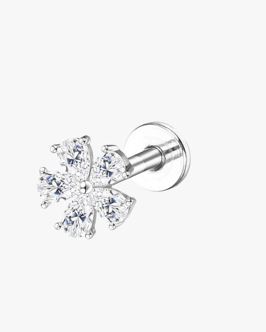A single silver-colored stud earring with a clear, ornate design featuring multiple smaller crystals.