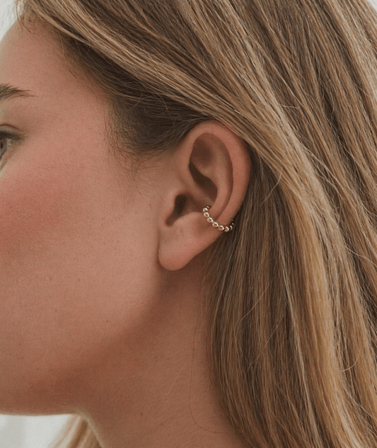 18K PVD Gold Beaded Ear Cuff on a model 