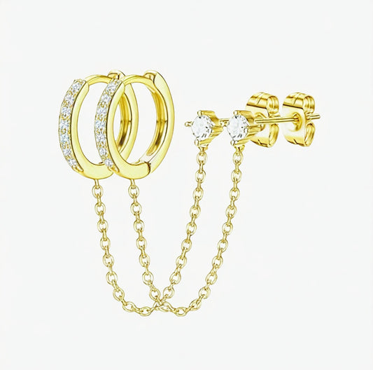 Gold hoop earrings with chain and gold stud earrings on a white background