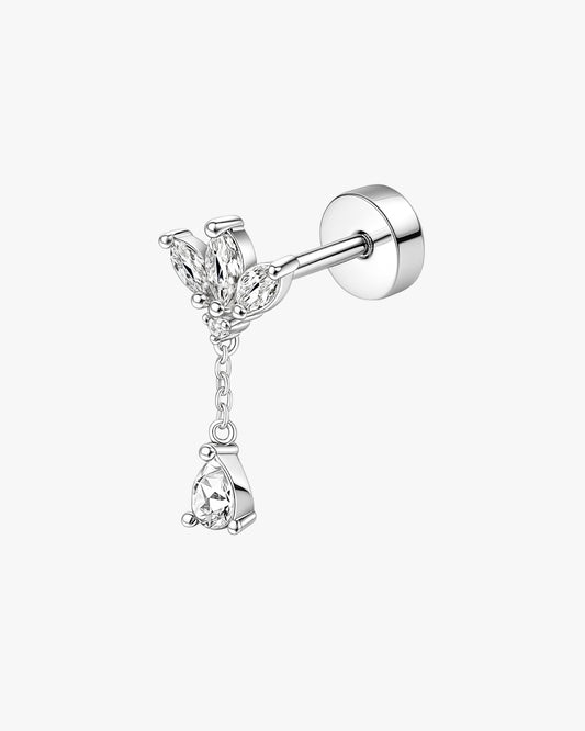 Silver earring with teardrop design on a white background