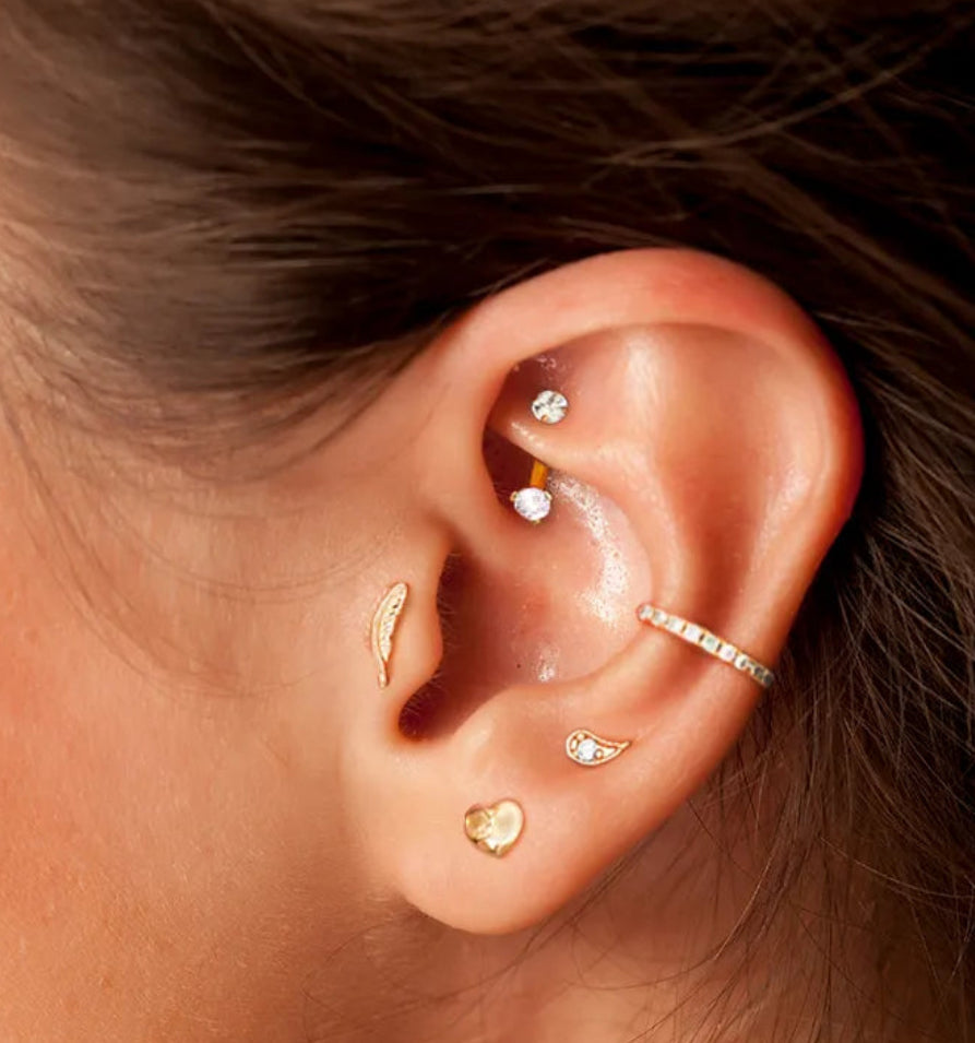 Premium surgical steel stud earrings for sensitive ears, minimalist design, tarnish-resistant, and ideal for multiple piercings.