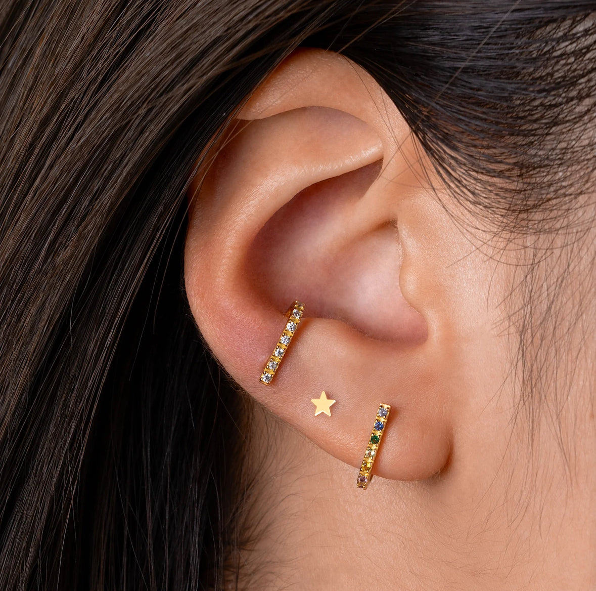 Gold Star Stud in ear