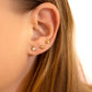 Sleek stainless steel huggie hoops for sensitive ears — timeless design.