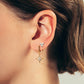 Statement stainless steel hoop earrings, star shape style in ear