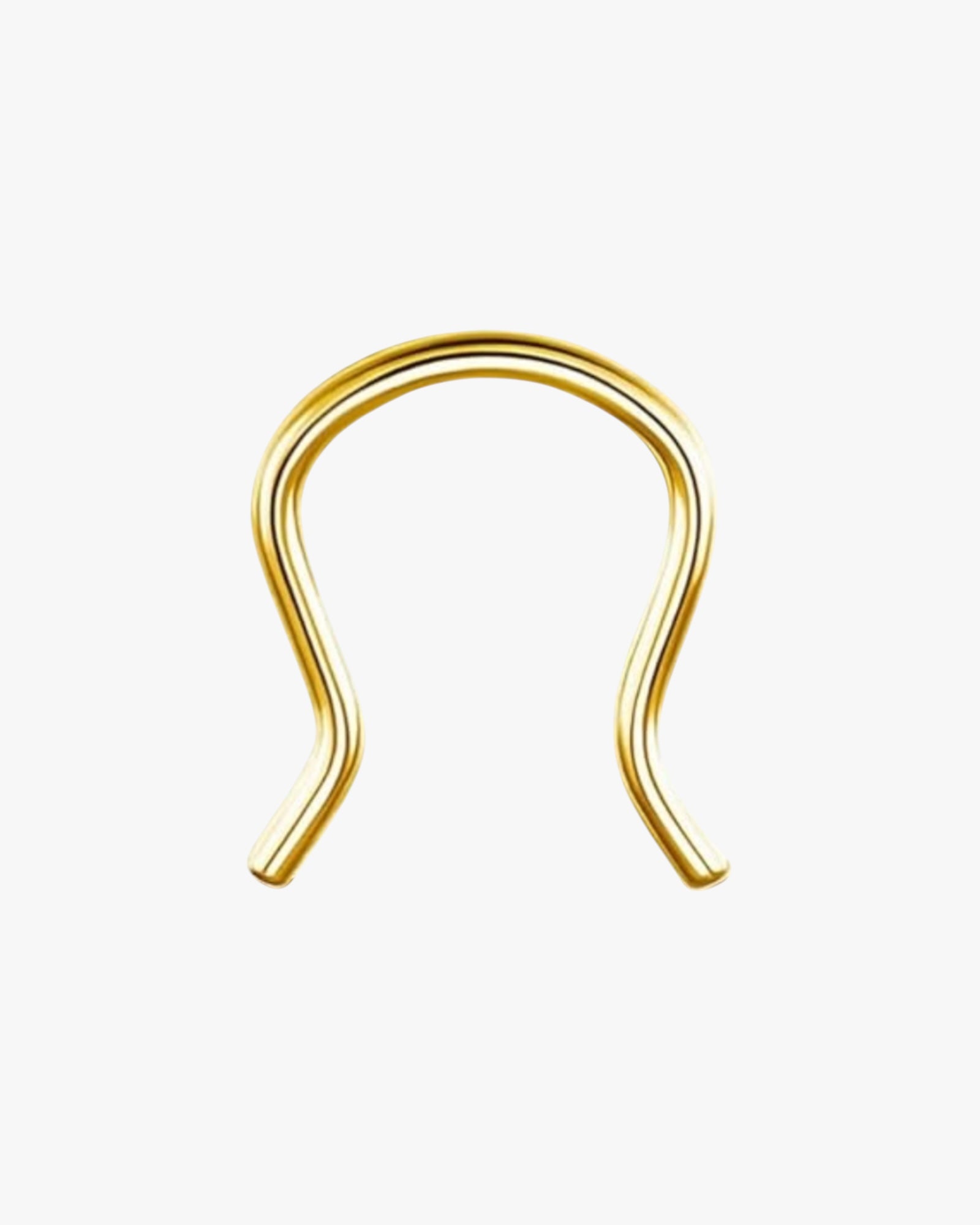 A gold-colored stainless steel septum piercing ring.