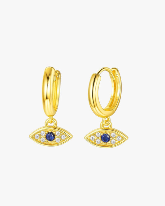 Gold hoop earrings with eye-shaped charms on a white background