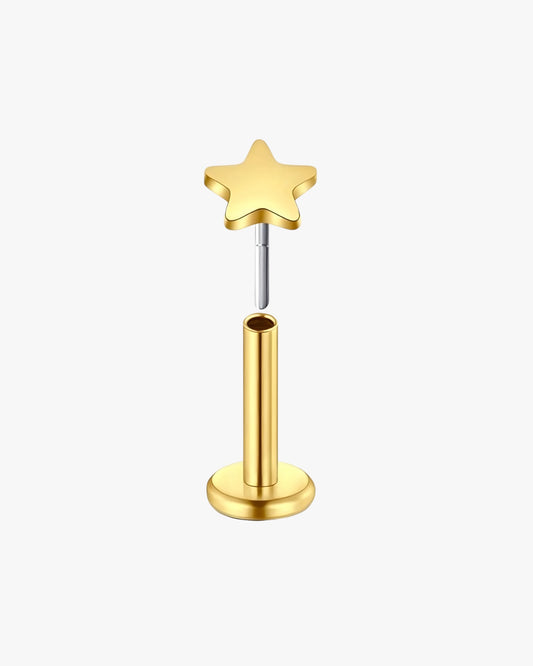Gold star-shaped earring on a white background