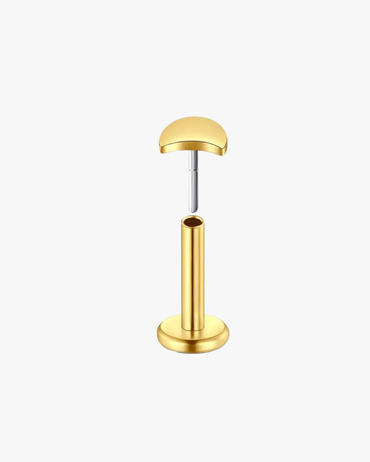 Gold-colored threadless stud on a white background