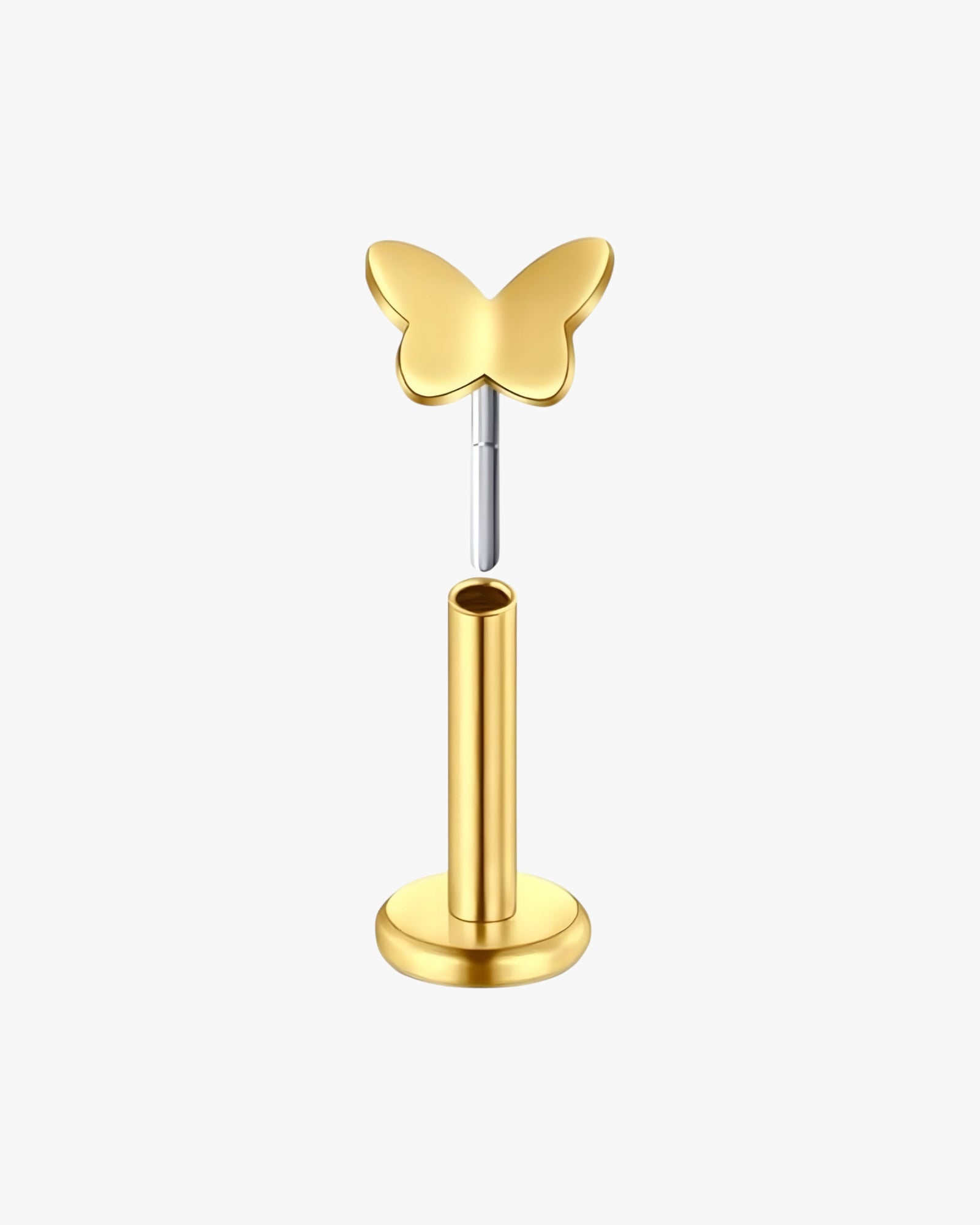 Gold butterfly-shaped earring on a white background