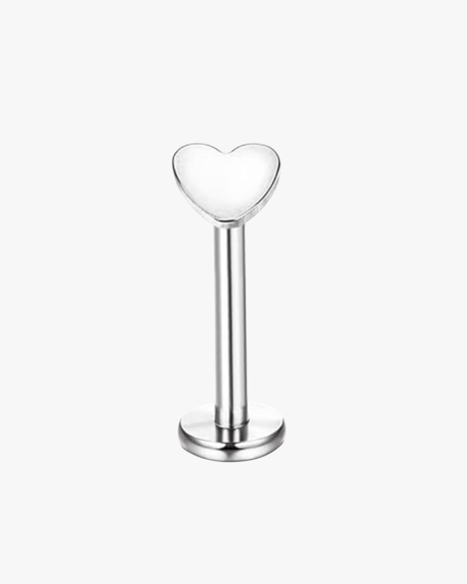 A single silver-colored stud earring with a heart-shaped back.