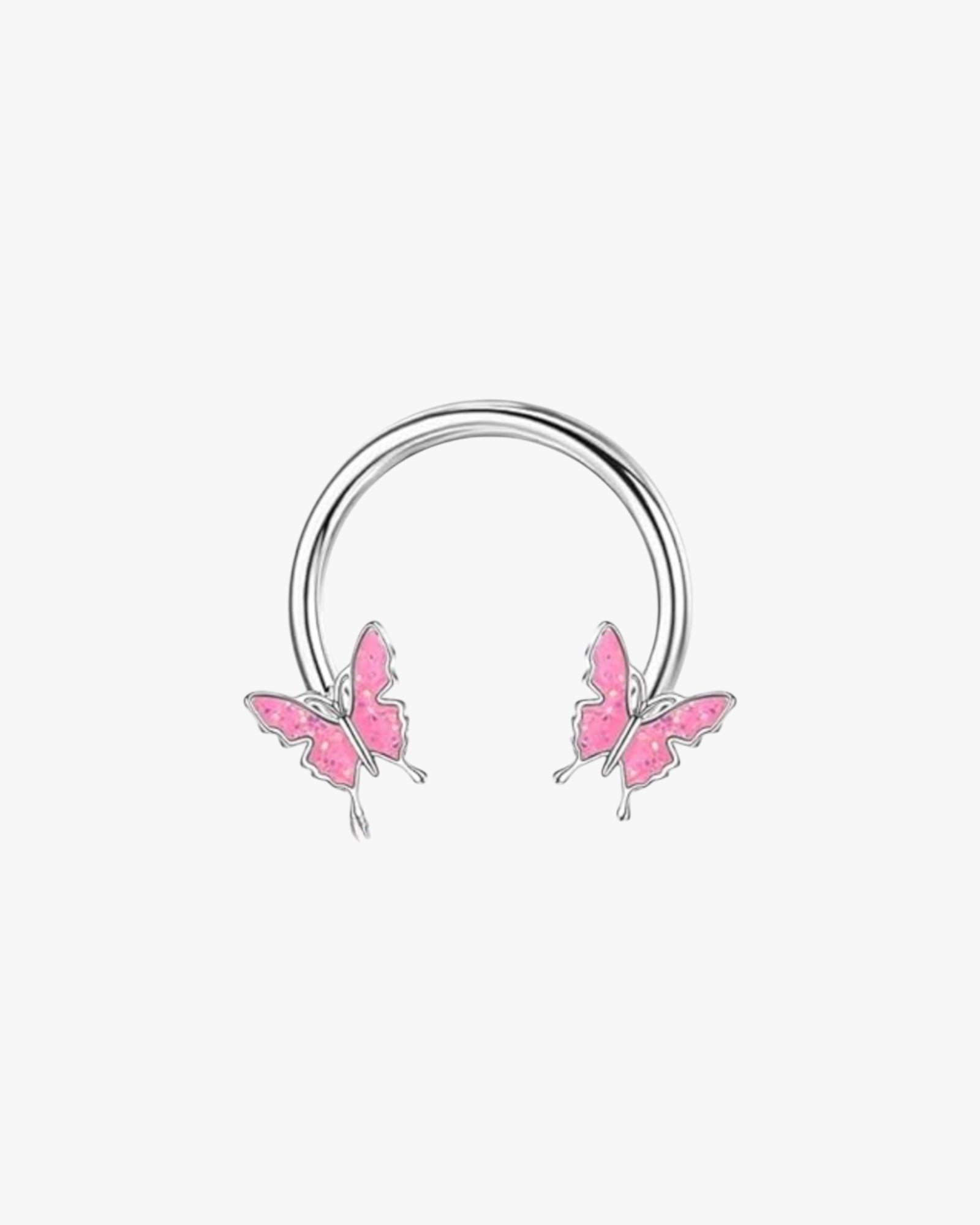A silver-colored hoop earring with two pink butterfly designs on it, against a white background.