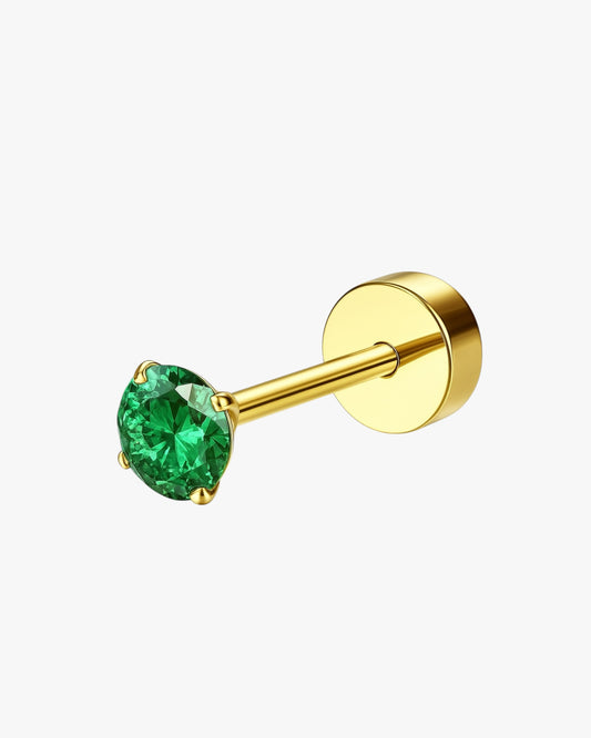 Gold stud earring with a green gemstone on a white background
