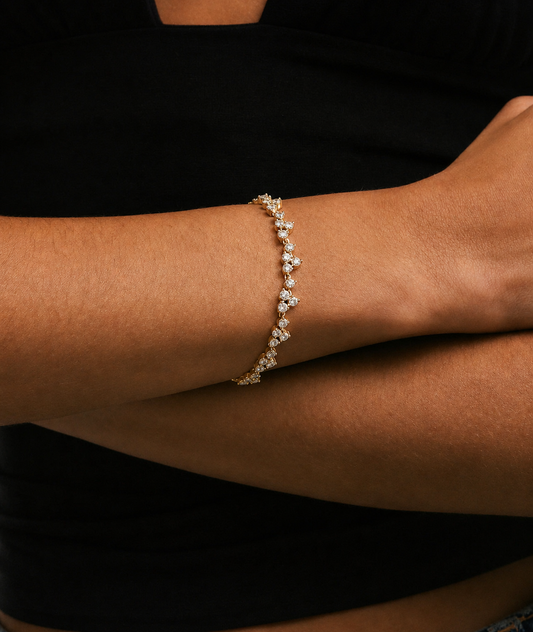 Bracelet on a wrist with a black background