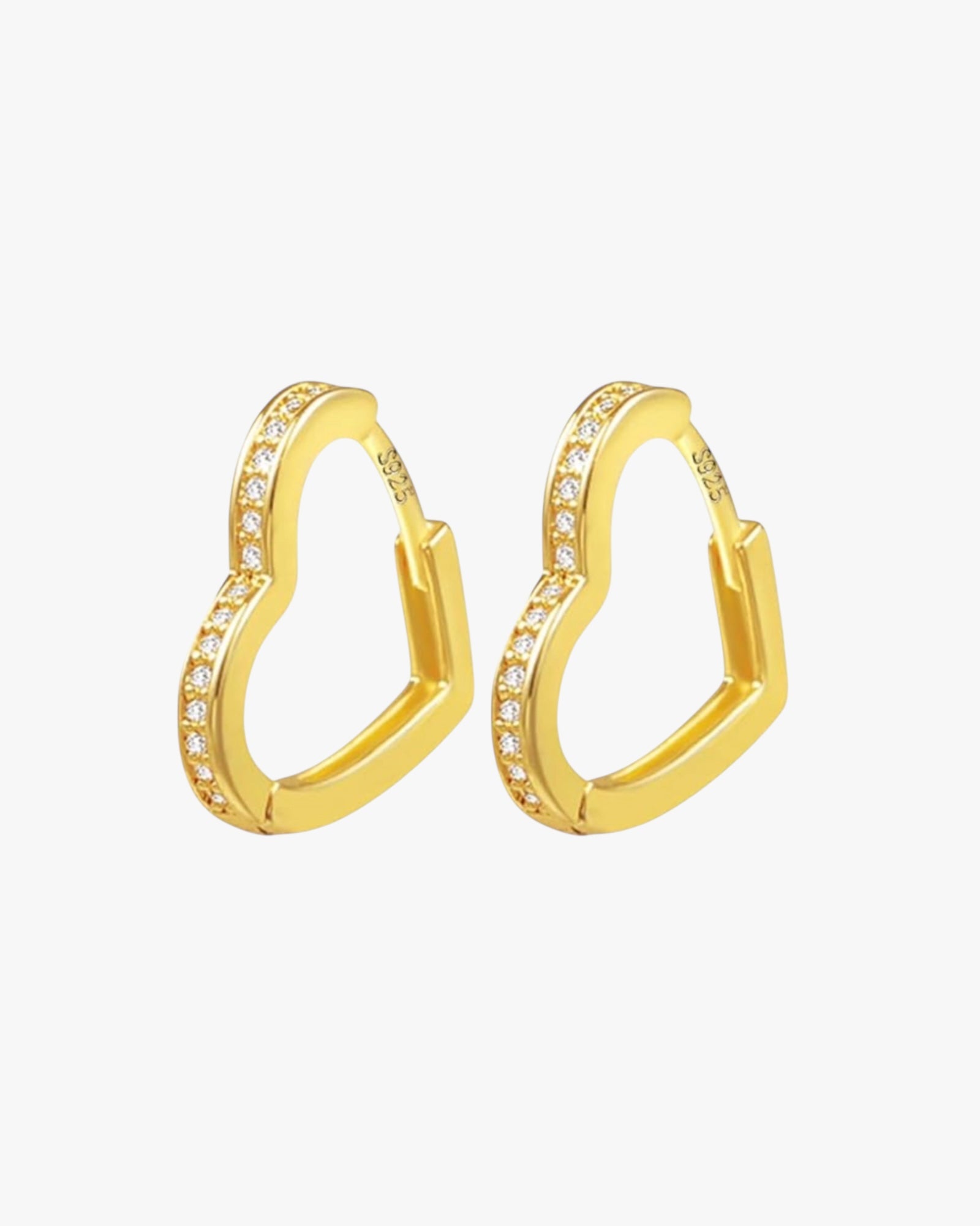 A pair of gold-colored hoop earrings with small, clear stones embedded along the hoop's length.
