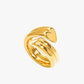 Gold ring with a unique design on a white background