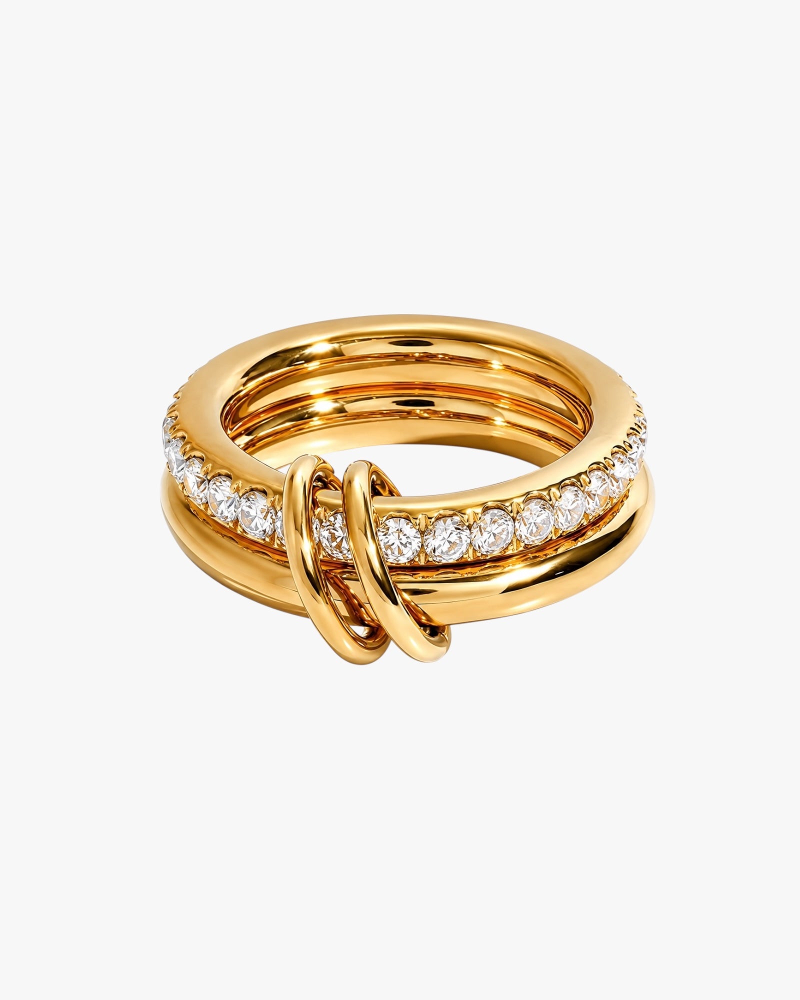 Gold ring with diamond accents on a white background
