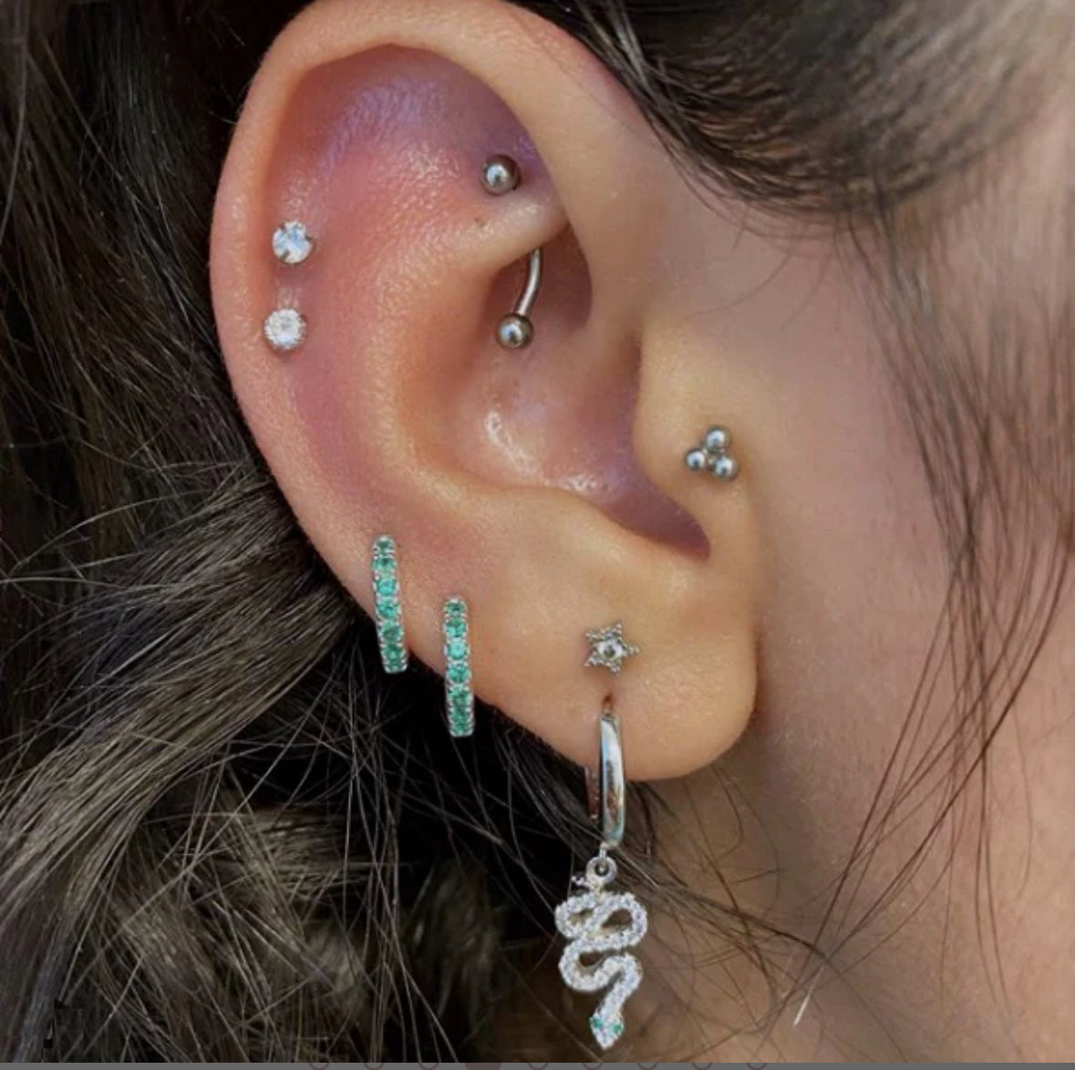 Hypoallergenic stainless steel studs for lobe and cartilage piercings. Durable, tarnish-resistant, and ideal for everyday wear.