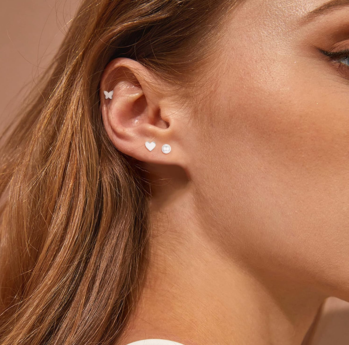 heart stud in ear silver