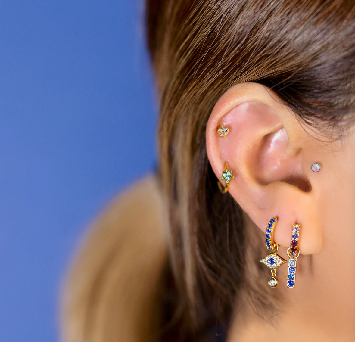 tragus piercing styled ear