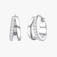 Minimalist stainless steel ear hoops for everyday wear in silver