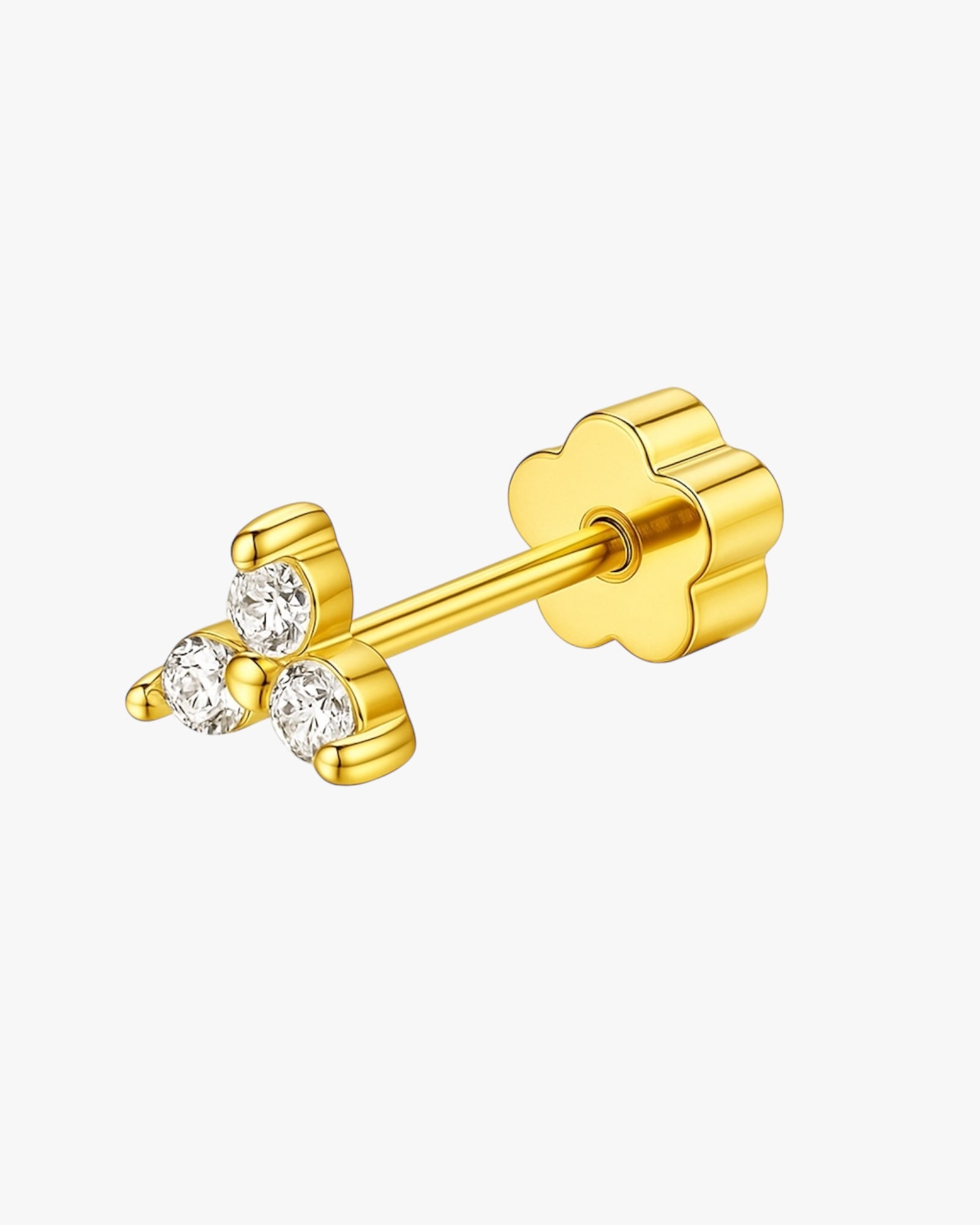 Gold stud earrings with three diamonds on a white background