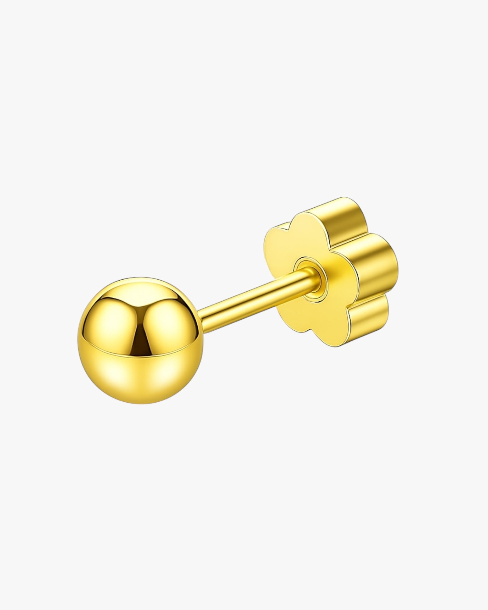 Gold earring on a white background