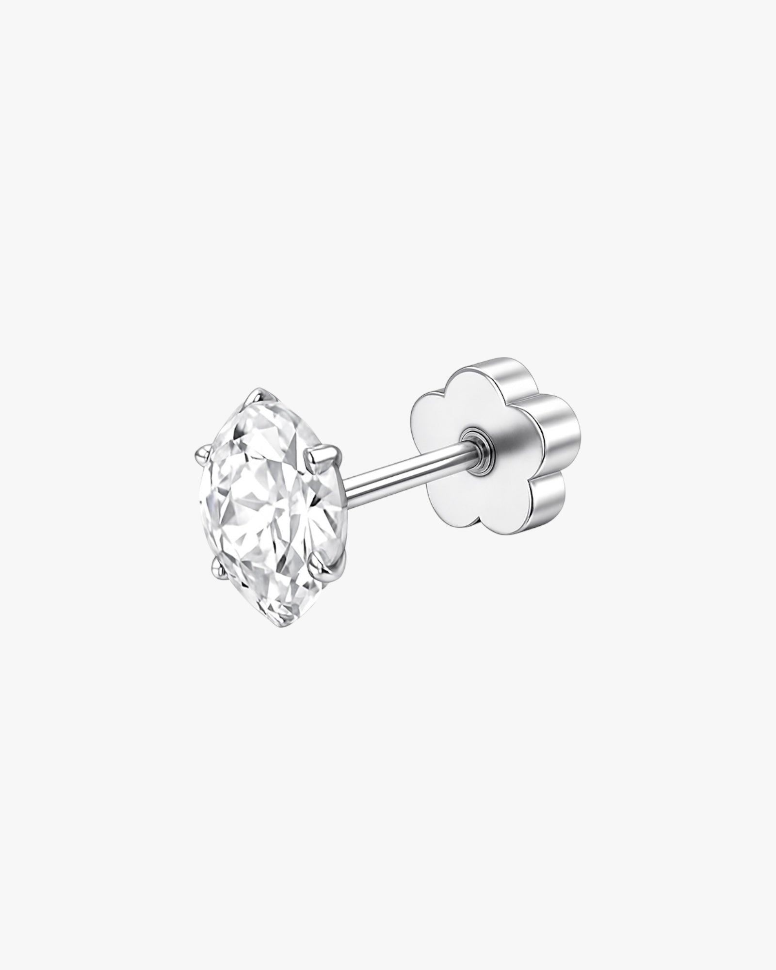Silver stud earring with a clear gemstone on a white background