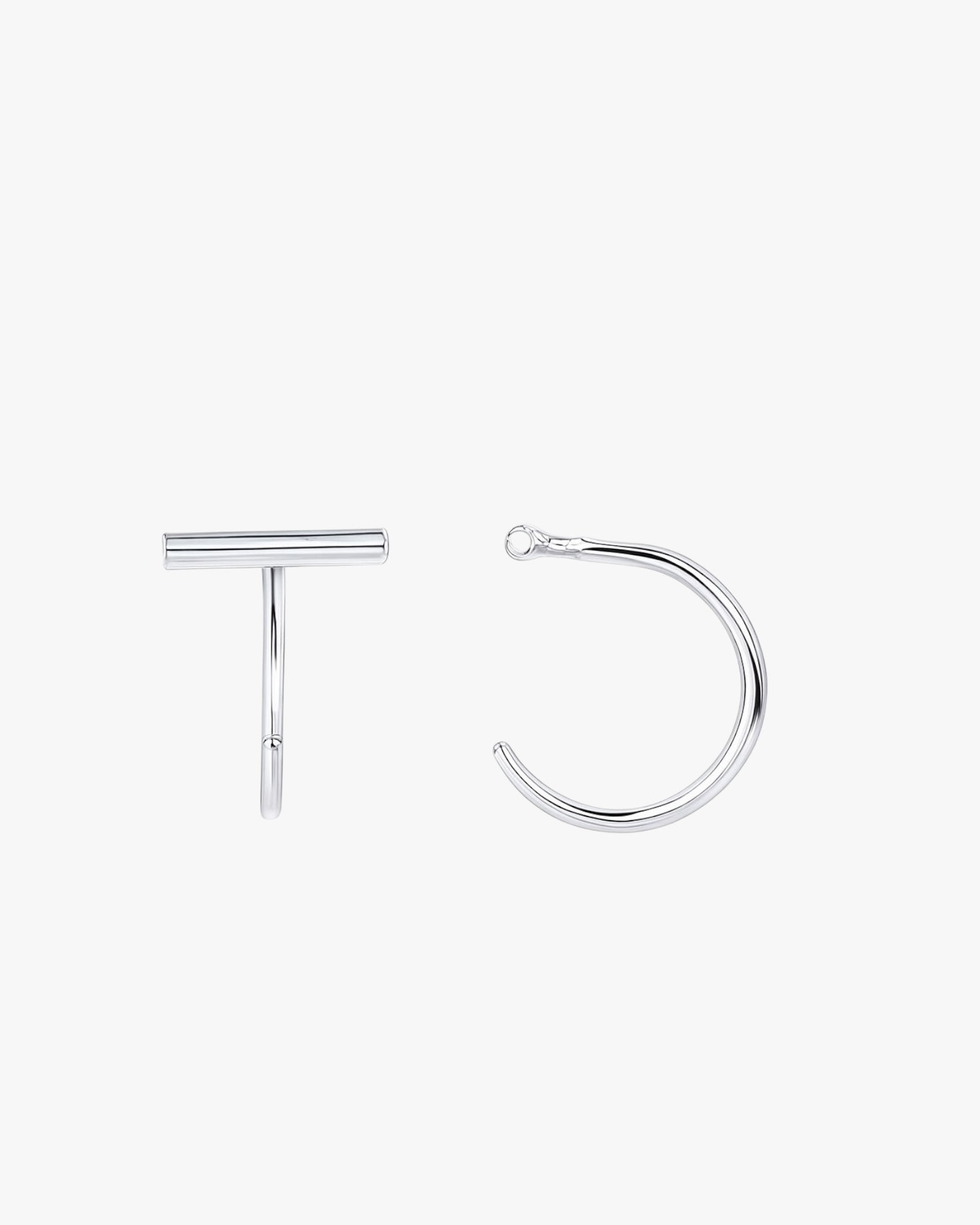 Two silver hoop earrings on a white background