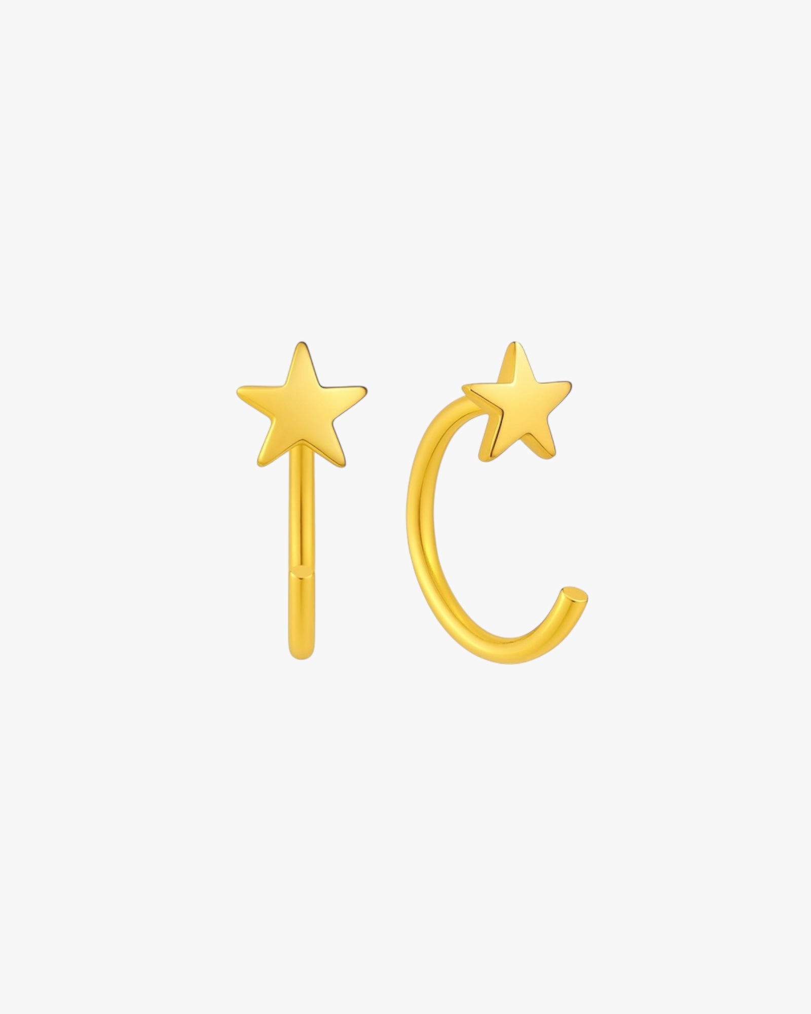 Gold star-shaped earrings on a white background