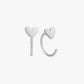 Heart-shaped silver earrings on a white background