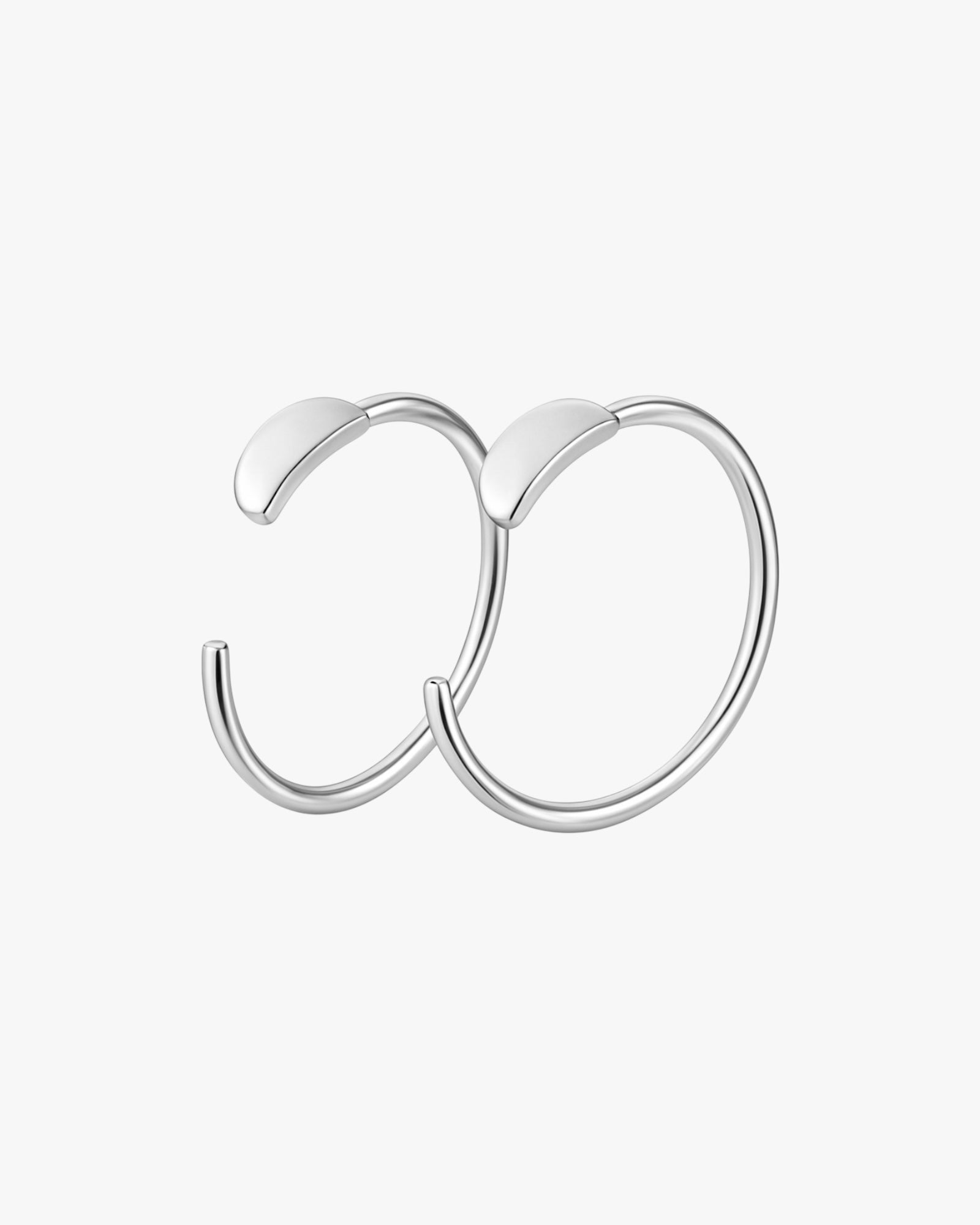 Silver hoop earrings on a white background