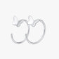 Silver hoop earrings with butterfly accents on a white background