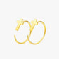Gold hoop earrings with cross designs on a white background