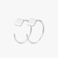 Silver hoop earrings with square tops on a white background