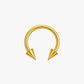 Gold nose ring with spike design on a white background