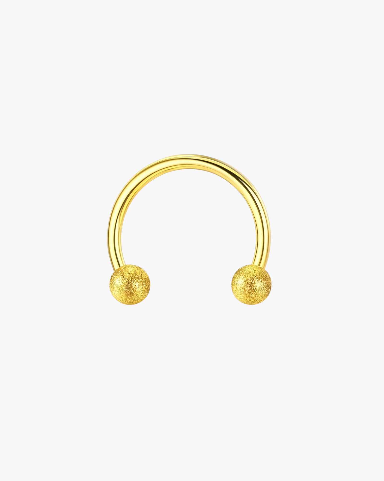 Gold hoop earring with spherical ends on a white background