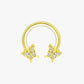 Gold hoop earrings with butterfly designs on a white background