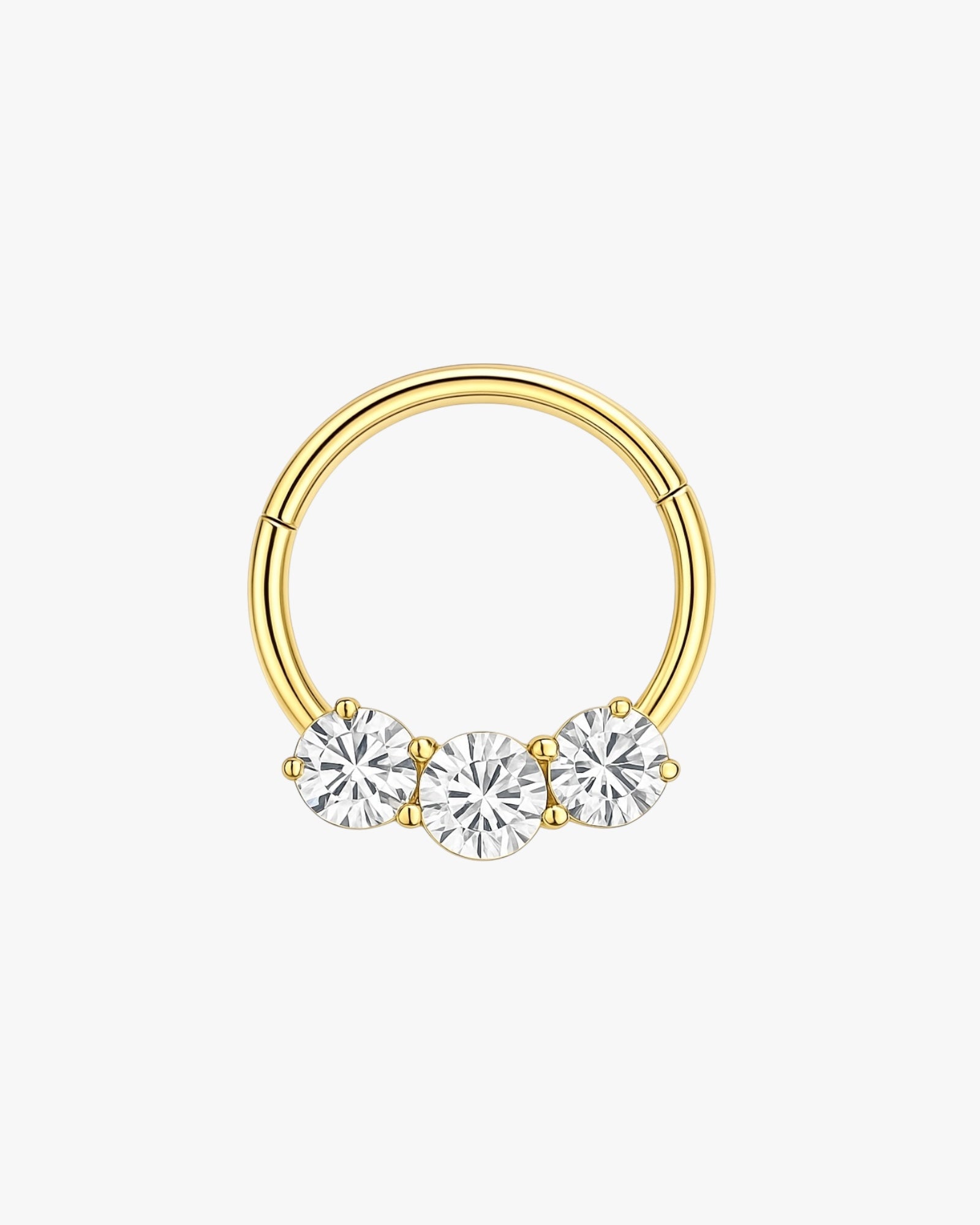 Gold nose ring with three clear gemstones on a white background